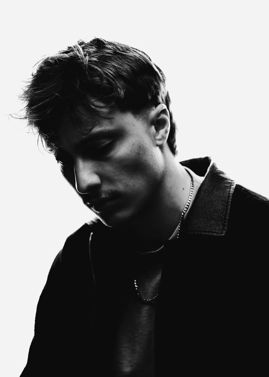Black and white portrait of Oliver Reinmann